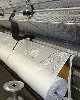 Lace 180" wide coming off knitting machine in Oxford NC